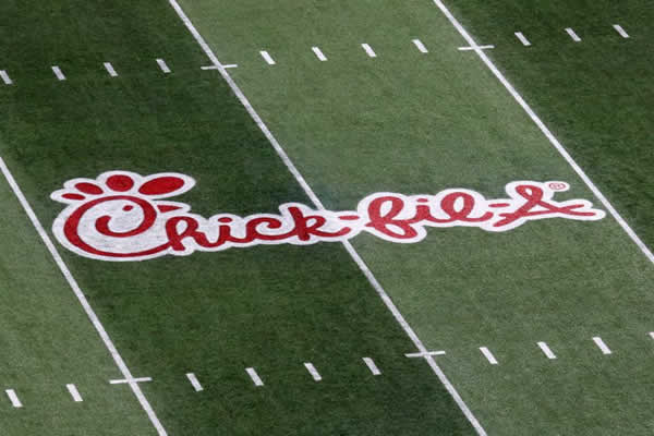 Chick Fil A logo on football field