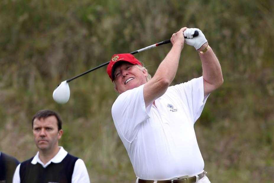 trump playing golf