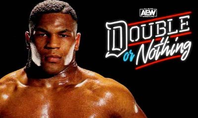 Mike Tyson next to AEW's Double or Nothing PPV logo
