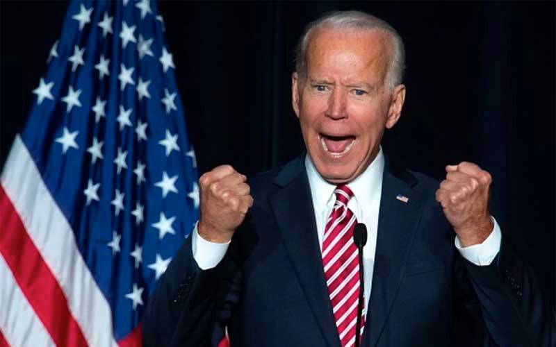 Joe Biden excited with fists clenched
