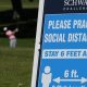golf course sign explaining social distancing requirements at 2020 charles schwab challenge
