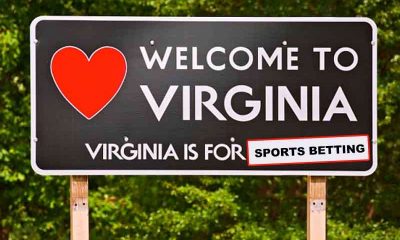 a road sign that states welcome to Virginia, Virginia is for sports betting