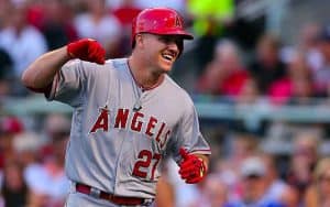 MLB baseball player Mike Trout pumping his fist in celebration