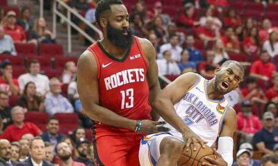 Chris Harden tangled up with Russell Westbrook