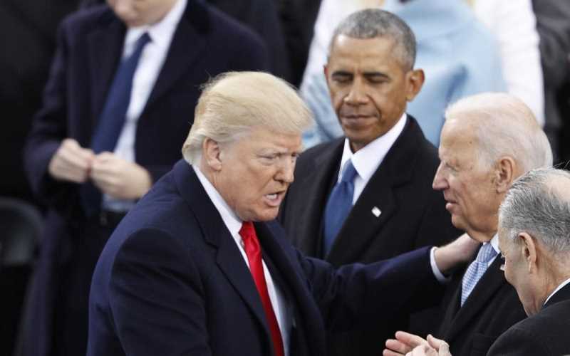 Trump shaking hands with Biden