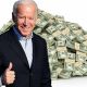 Biden giving a thumbs up in front of a pile of cash