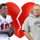 Brady and Belichick with a broken heart behind them