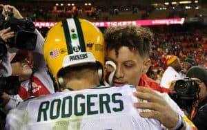 Aaron Rodgers hugging Patrick Mahomes