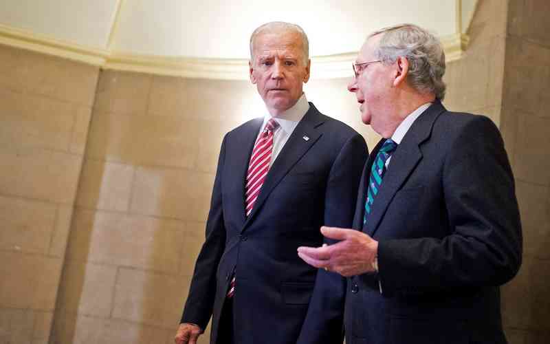 Senator McConnell talking to President Biden