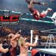 WWE Wrestler jumping off of a ladder onto other wrestlers
