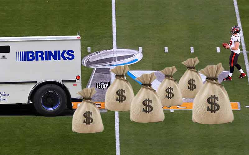 Bank truck dropping bags of cash on the Super Bowl 55 field