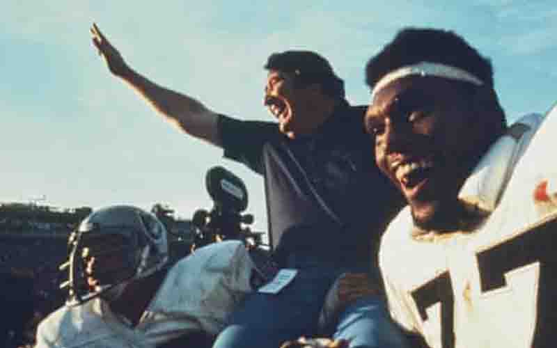 John Madden celebrates his Super Bowl XI win with the Oakland Raiders