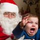sad santa with screaming child