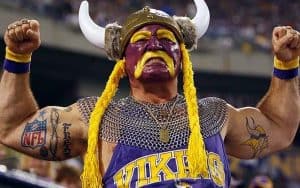 Minnesota legal sports betting fan flexes muscles