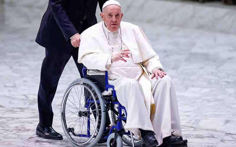 image of Pope Francis in a wheelchair betting on next pope odds