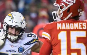 Joey Bosa trying to sack Patrick Mahomes