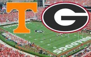 Tennessee Volunteers and Georgia Bulldogs logos hovering over Sanford Stadium