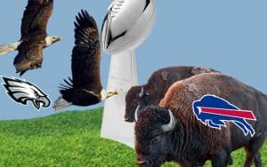 two eagles and two buffalo heading toward a Lombardi Trophy in a grassy field