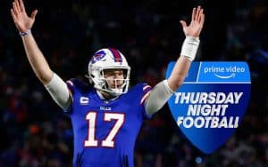Patriots football player with arms raised