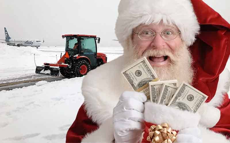 Santa Claus holds some cash in front of a closed airport because of snow
