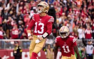 Brock Purdy of the San Francisco 49ers celebrating a touchdown