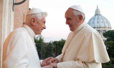 Pope Francis I shaking hands with Pope Benedict XVI