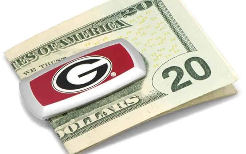 a $20 bill in a University of Georgia money clip