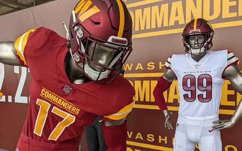 two mannequins wearing the Washington Commanders' new uniforms