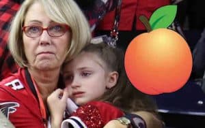 sad Atlanta Falcons fans next to a Georgia Peach logo