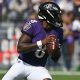 Baltimore Ravens QB Lamar Jackson drops back for a pass