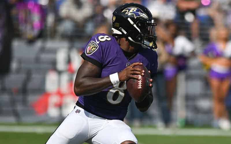 Baltimore Ravens QB Lamar Jackson drops back for a pass