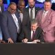 Governor Cooper signing a North Carolina sports betting bill