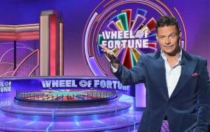 Ryan Seacrest hosting an episode of Wheel of Fortune
