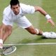 Novak Djokovic stretching for a ball at Wimbledon 2023