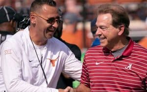 Steve Sarkisian and Nick Saban shaking hands