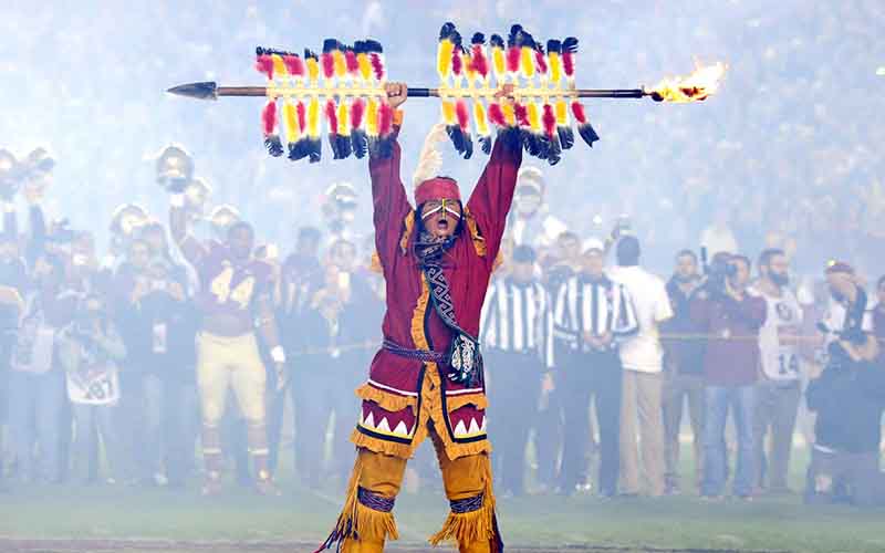 Chief Osceola with flaming spear held above his head