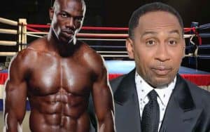 Terrell Owens and Stephen A. Smith in front of a boxing ring