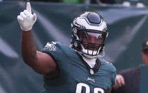 Jalen Carter of the Philadelphia Eagles pointing to the crowd