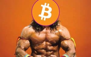 An intense muscular man flexing with a Bitcoin logo over his face