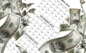 Q4 2023 calendar surrounded by falling cash