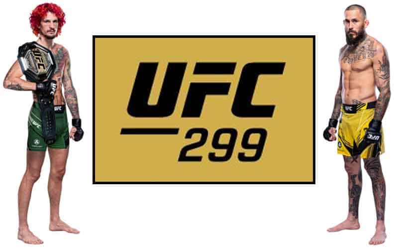 UFC 299 logo with Sean O'Malley and Marlon Vera standing on either side of it