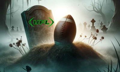 A UFL Football sitting on a grave