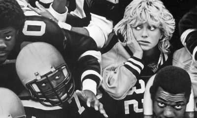 Goldie Hawn in a football pile up