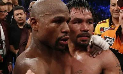 Floyd Mayweather and Manny Pacquiao embracing after their first fight