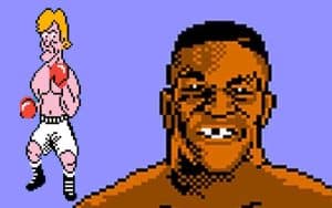Mike Tyson and Glass Joe looking like Jake Paul in the Punch Out video game from Ninetendo
