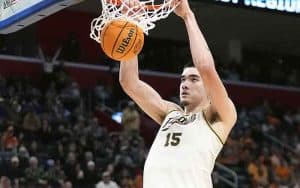 Zach Edey of the Purdue Boilermakers dunking a basketball