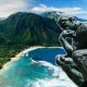 The Thinker statue in front of Hawaiian islands