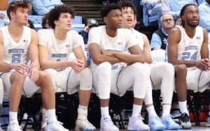 North Carolina Tarheels basketball team sitting on the bench