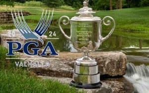2024 PGA Championship logo next to the trophy placed on the golf course