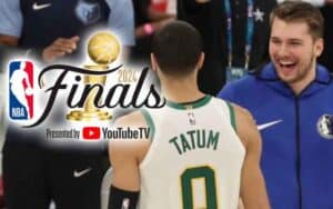 Jayson Tatum and Luka Doncic talking on the sidelines